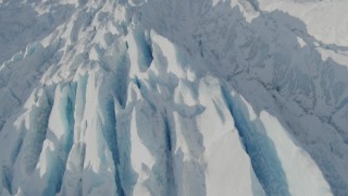 4K aerial stock footage the jagged, snow covered surface of the Knik Glacier, Alaska Aerial Stock Footage | AK0001_1421