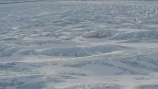 4K aerial stock footage the snow covered surface of the Knik Glacier, Alaska Aerial Stock Footage | AK0001_1423