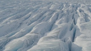 4K aerial stock footage the ridged, snow covered surface of the Knik Glacier, Alaska Aerial Stock Footage | AK0001_1425