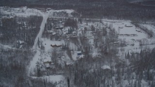 4K aerial stock footage a snow covered mobile home park in Chugiak, Alaska Aerial Stock Footage | AK0001_1626