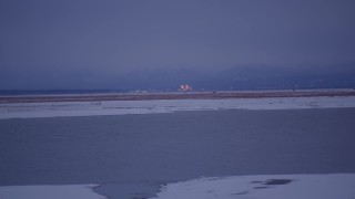 4K aerial stock footage approaching Downtown Anchorage from Point MacKenzie, Alaska, twilight Aerial Stock Footage | AK0001_1709