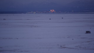 4K aerial stock footage tilt to reveal Downtown Anchorage, seen from Point MacKenzie, Alaska, twilight Aerial Stock Footage | AK0001_1712