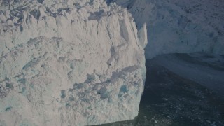 4K aerial stock footage the jagged edge of the snow covered glacier at end of Harriman Fjord, Alaska Aerial Stock Footage | AK0001_1803