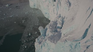 4K aerial stock footage the edge of a snow covered glacier on the Harriman Fjord, Alaska Aerial Stock Footage | AK0001_1806