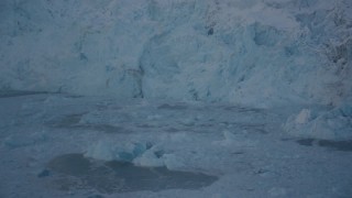 4K aerial stock footage approaching glacial ice floating in Harriman Fjord, Alaska in snow Aerial Stock Footage | AK0001_1815