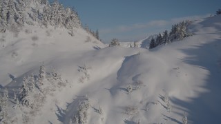 4K aerial stock footage flying over a snowy ridge, Chugach Mountains, Alaska Aerial Stock Footage | AK0001_1891