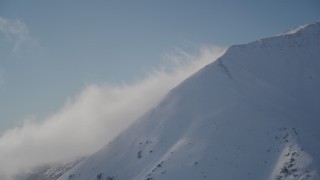 4K aerial stock footage windblown, snow covered mountain slopes in Chugach Mountains, Alaska Aerial Stock Footage | AK0001_1972