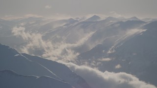 4K aerial stock footage snow covered, windswept Kenai Mountains, Alaska Aerial Stock Footage | AK0001_1981