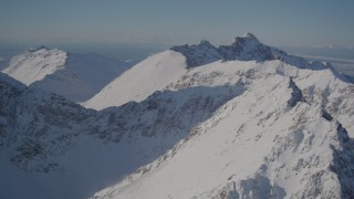 4K aerial stock footage flying over the snow covered Chugach Mountains, Alaska Aerial Stock Footage | AK0001_1987