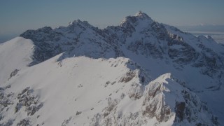 4K aerial stock footage flying over the snow covered Chugach Mountains, Alaska Aerial Stock Footage | AK0001_1990