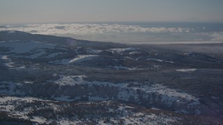 4K aerial stock footage rolling hills and forests near the Chugach Mountains, Alaska in snow Aerial Stock Footage | AK0001_2001