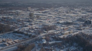 4K aerial stock footage panning across snow covered residential neighborhoods, Anchorage, Alaska Aerial Stock Footage | AK0001_2025