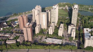 4.8K aerial stock footage passing a group of lakefront apartment buildings in Hyde Park, Chicago, Illinois Aerial Stock Footage | AX0001_012