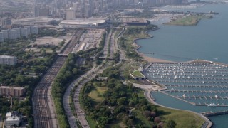 4.8K aerial stock footage tilt from Highway 41 to reveal Downtown Chicago skyline in Illinois Aerial Stock Footage | AX0001_015