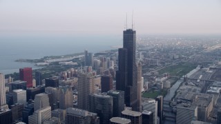 4.8K aeria video  tilt from the Chicago River to reveal Willis Tower in Downtown Chicago, Illinois Aerial Stock Footage | AX0001_033