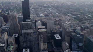 4.8K aerial stock footage tilt from bird's eye of Chicago River, reveal Willis Tower, Downtown Chicago, Illinois Aerial Stock Footage | AX0001_034