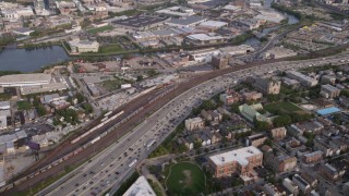 4.8K aerial stock footagev from heavy traffic on Interstate 90 and 94, and reveal Downtown Chicago skyline on a hazy day, Illinois Aerial Stock Footage | AX0001_061