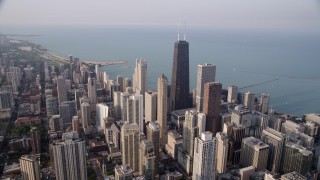 4.8K aerial stock footage video approaching John Hancock Center, Lake Michigan, Downtown Chicago, Illinois Aerial Stock Footage | AX0001_085