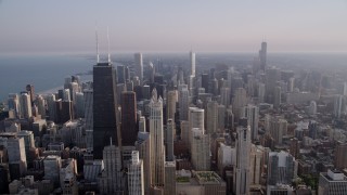 4.8K aerial stock footage flying by John Hancock Center and downtown high-rises in Downtown Chicago, Illinois Aerial Stock Footage | AX0001_089