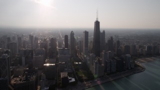 4.8K aerial stock footage of John Hancock Center and skyscrapers seen from the lake, Downtown Chicago, Illinois Aerial Stock Footage | AX0001_091