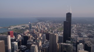 4.8K aerial stock footage flyby Willis Tower with Lake Michigan in the background, Downtown Chicago, Illinois Aerial Stock Footage | AX0001_108