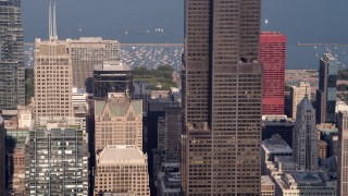 4.8K aerial stock footage tilting up side of Willis Tower, Downtown Chicago, Illinois Aerial Stock Footage | AX0001_111