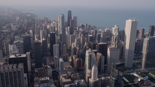 4.8K aerial stock footage fly over downtown to approach skyscrapers and the lake in Downtown Chicago, Illinois Aerial Stock Footage | AX0001_115