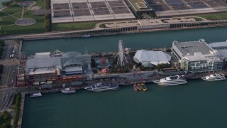 4.8K aerial stock footage of Ferris Wheel on Navy Pier in Chicago, Illinois Aerial Stock Footage | AX0001_122