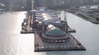 4.8K aerial stock footage orbiting the end of Navy Pier on a hazy day, Chicago, Illinois Aerial Stock Footage | AX0001_125