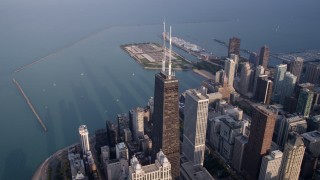 4.8K aerial stock footage of John Hancock Center near Lake Michigan, Downtown Chicago, Illinois Aerial Stock Footage | AX0001_133