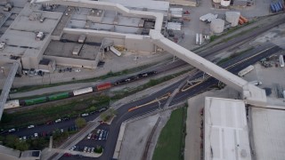 AX0001_173 - Aerial stock footage of 4.8K aerialvideo track train passing Ford Motor Company in Hegewisch, Chicago, Illinois