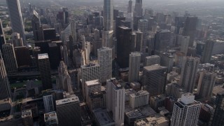 4.8K aerial stock footage tilt to N Michigan Avenue and reveal Tribune Tower and Chicago River, Downtown Chicago, Illinois Aerial Stock Footage | AX0002_026