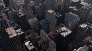 4.8K aerial stock footage approach Willis Tower, and tilt down to Downtown Chicago skyscrapers, Illinois Aerial Stock Footage | AX0002_029