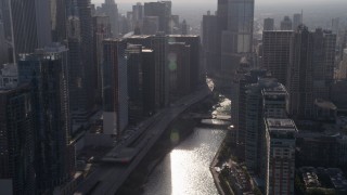 AX0002_052 - 4.8K aerial stock footage fly over bridge at the mouth of the Chicago River, Downtown Chicago, Illinois