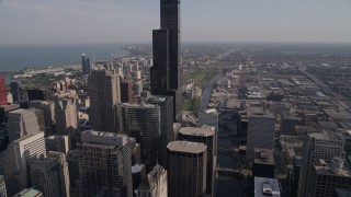 4.8K aerial stock footage tilt from Chicago River to approach Willis Tower, Downtown Chicago, Illinois Aerial Stock Footage | AX0002_057