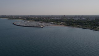 4.8K aerial stock footage of flying over Lake Michigan toward 31st Street Harbor, Chicago, Illinois Aerial Stock Footage | AX0002_089