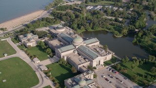 4.8K aerial stock footage of flying by Hyde Park apartment buildings to approach Museum of Science and Industry, Chicago, Illinois Aerial Stock Footage | AX0002_096