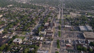 4.8K aerial stock footage fly over Mosque Maryam and follow S Stony Island Avenue past urban neighborhoods, South Chicago, Illinois Aerial Stock Footage | AX0002_100