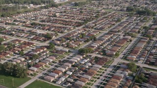 4.8K aerial stock footage of flying over rows of suburban homes in Lansing, Illinois Aerial Stock Footage | AX0002_105