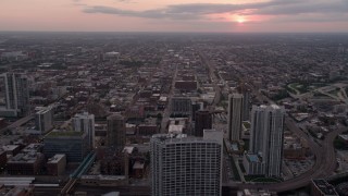 4.8K aerial stock footage of flying over 333 N Canal Street condo complex and apartment buildings, West Chicago, Illinois, sunset Aerial Stock Footage | AX0003_041