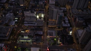 4.8K aerial stock footage of a bird's eye view of following Clark Street through Downtown Chicago at twilight, Illinois Aerial Stock Footage | AX0003_110