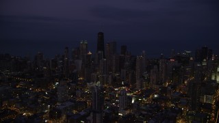 4.8K aerial stock footage of Downtown Chicago cityscape at nighttime, Illinois Aerial Stock Footage | AX0003_137