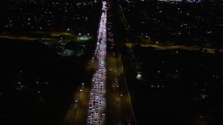 5K aerial stock footage fly over heavy nighttime traffic on Interstate 170 through Sun Valley, California Aerial Stock Footage | AX0004_001E