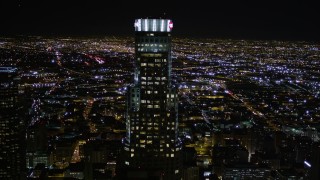 5K aerial stock footage approach US Bank Tower in Downtown Los Angeles at night, California Aerial Stock Footage | AX0004_022E