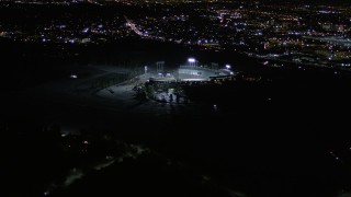 5K aerial stock footage orbit Dodger Stadium at night in Los Angeles, California Aerial Stock Footage | AX0004_032E