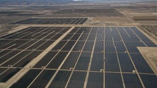 5K aerial stock footage approach and fly over Mojave Desert solar energy array in California Aerial Stock Footage | AX0005_119E