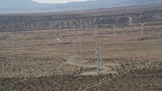 5K aerial stock footage circle a group of Mojave Desert windmills in Antelope Valley, California Aerial Stock Footage | AX0005_145