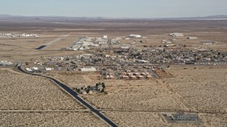 AX0006_052 - 5K aerial stock footage approach Mojave Air and Space Port in California