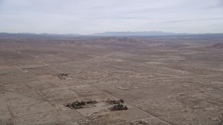 5K aerial stock footage of panning across the open desert at the Mojave Desert, California Aerial Stock Footage | AX0006_112