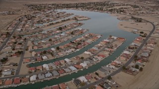 5K aerial stock footage orbit lakeside homes in a small desert town in Helendale, California Aerial Stock Footage | AX0006_166E